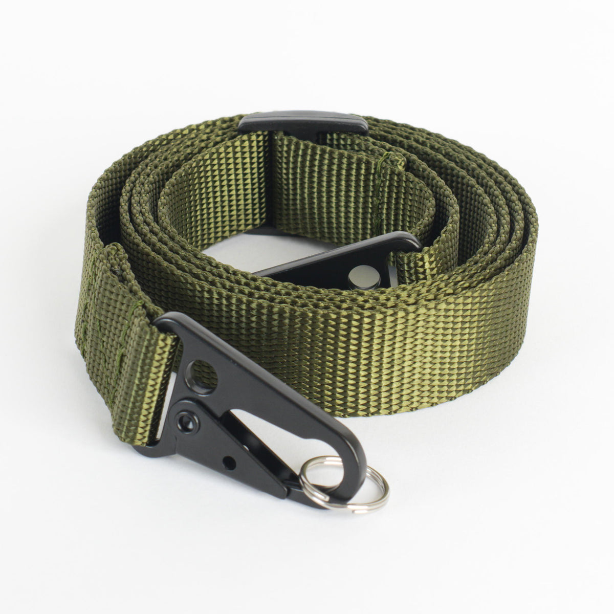 An olive nylon adjustable strap with black metal clips and black plastic slider, laid in a coil on a white background.