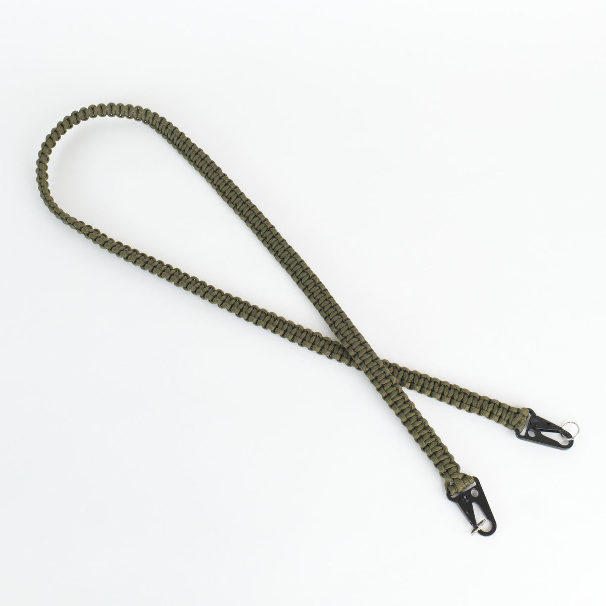 An olive green paracord shoulder strap with black metal snap hooks on both ends, laid out on a clean white background.