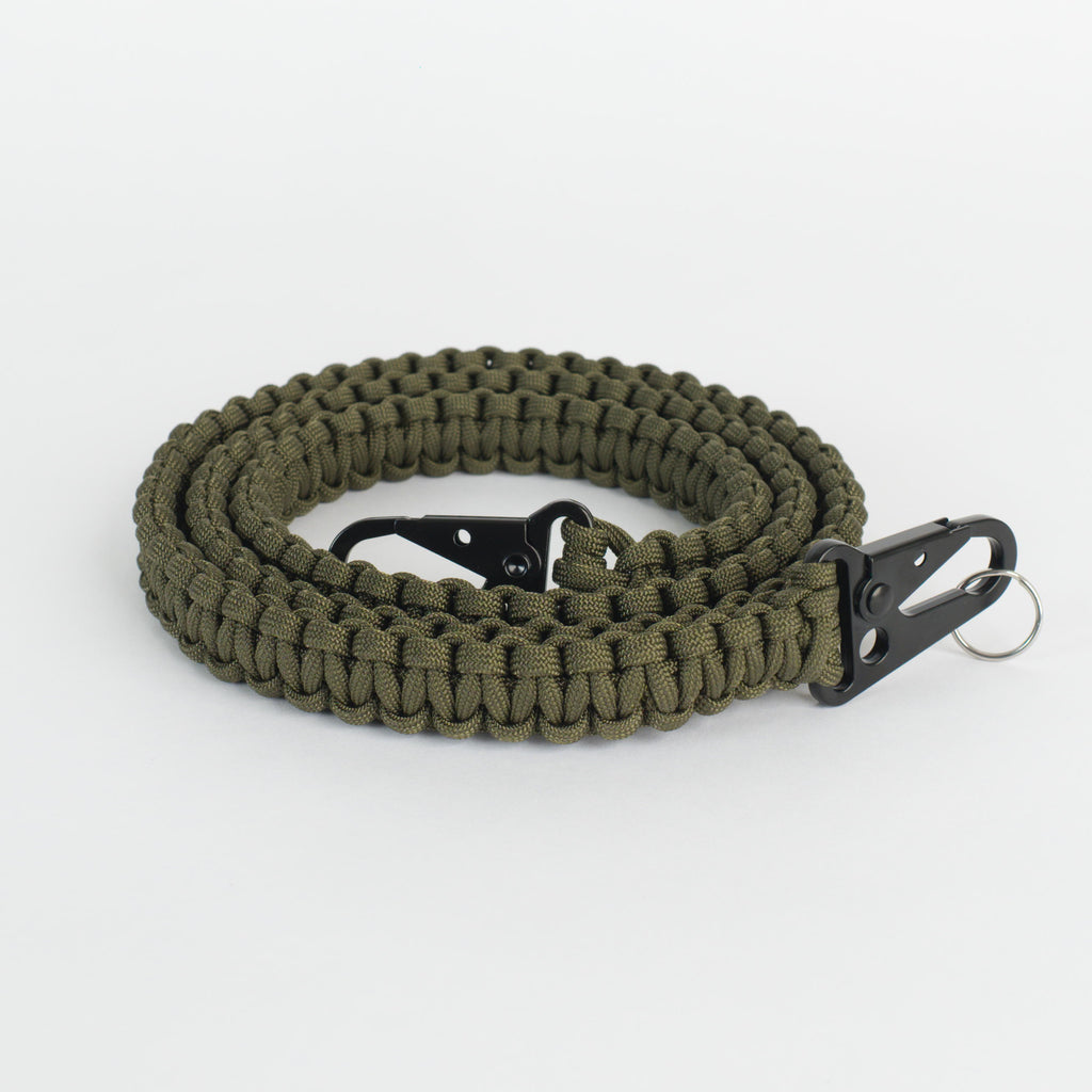 Paracord strap coiled on a white background