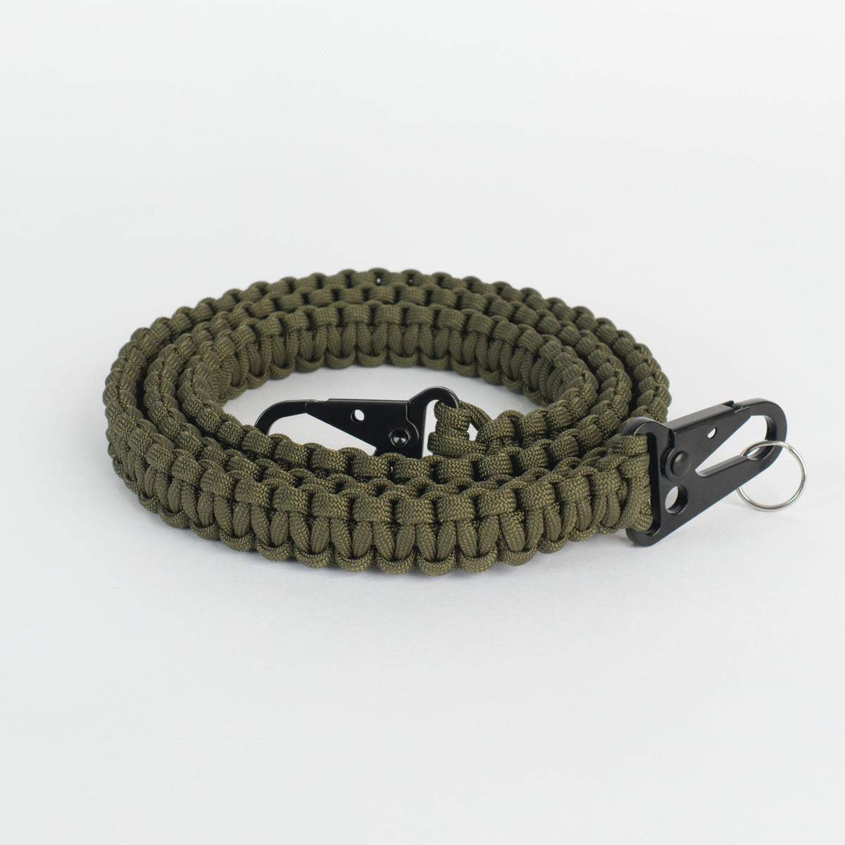Paracord strap coiled on a white background