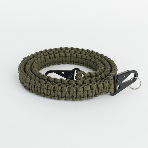 Paracord strap coiled on a white background