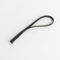 A small black nylon wrist strap.